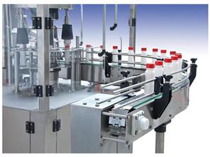 BOTTLE FILLING CAPPING MACHINE